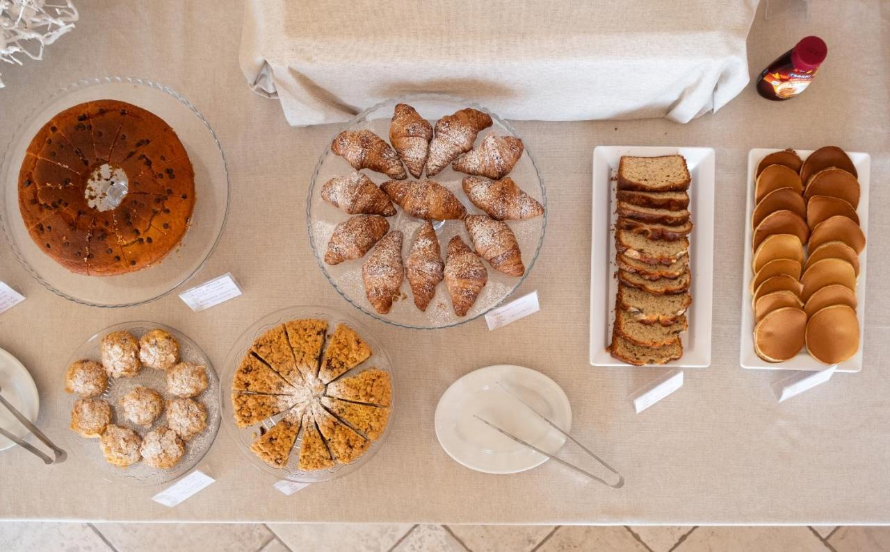 Moma Hotel Cannigione Bagian luar foto
